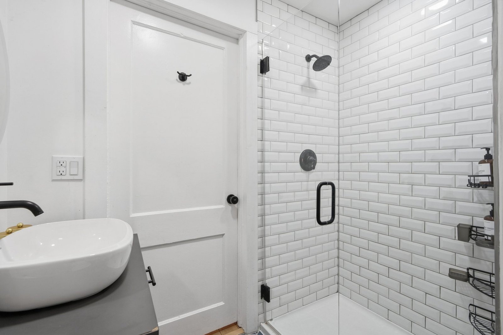 Renovated bathroom with walk-in glass shower