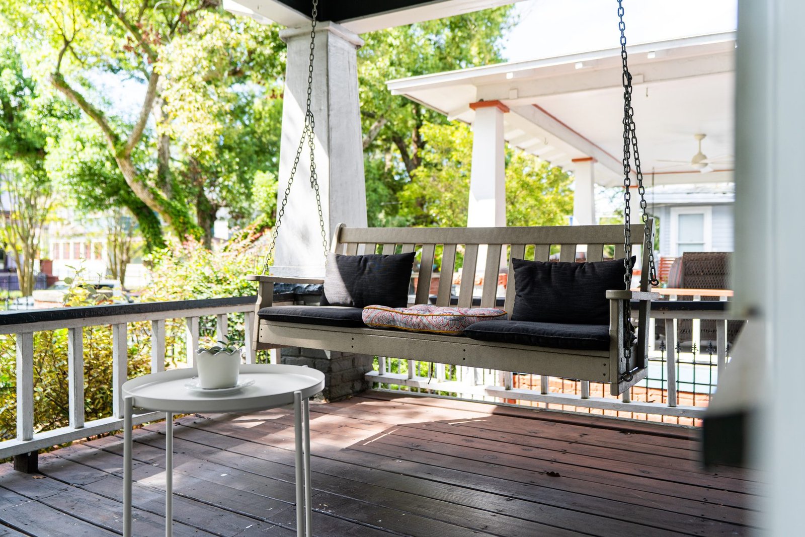 Covered Riverside front porch with swing
